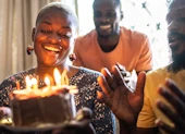 adults celebrating woman's birthday