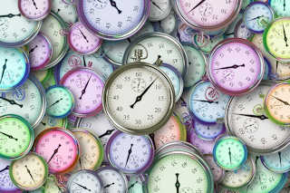 Pile of watches signifying the passage of time Pile of watches signifying the passage of time