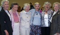 Group of ladies celebrating 90th birthday of the party "girl"