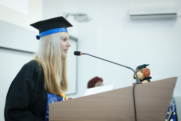 girl speaking at graduation